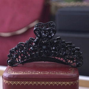 Macro shot of 9cm vintage black crown hair claw with crystal rhinestones and metal finish