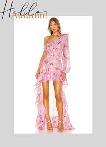 Detail of pink floral chiffon dress with asymmetrical hem and belted waist design