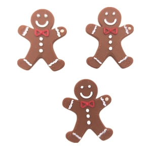 Set of three gingerbread man Christmas ornaments for tree decoration on white background