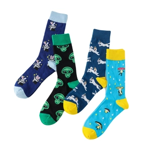 Set of four cotton crew socks featuring colorful alien, animal, and fruit knitted patterns
