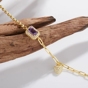Bracelet élégant en argent S925 doré avec pierre violette et pendentif coeur
