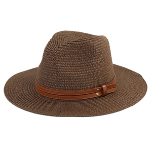 Classic Panama straw hat with brown leather band and metallic gold buckle for sun protection