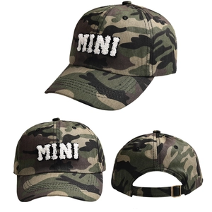 Close-up of camouflage cotton baseball cap with MINI letter embroidery and metal buckle