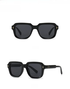 Dual view of black square sunglasses with metallic rivet details on white background