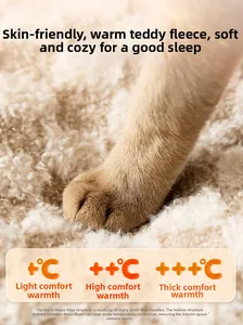 Detail of soft teddy velvet pet bed fabric showing three warmth levels with a cat paw