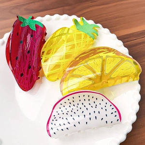 Cute fruit-shaped hair claws set including strawberry, pineapple, and lemon designs