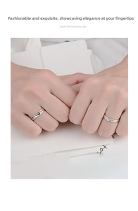 Detail of silver Mobius couple rings featuring twisted rope design and pavé cubic zirconia