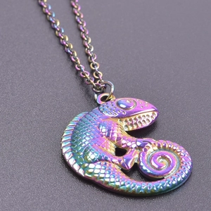 Macro shot of colorful chameleon lizard pendant necklace in rainbow titanium steel finish