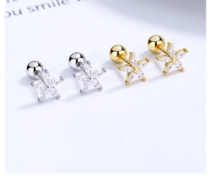 Detailed close-up of 925 sterling silver flower stud earrings with zirconia stones