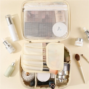 Large PU leather makeup bag with brush slots and adjustable compartments for travel