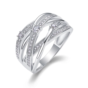 Silver criss-cross multi-layer ring with sparkling clear stones on a white backdrop
