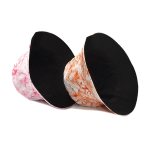 Double-sided floral print bucket hat with colorful flowers and black inner lining