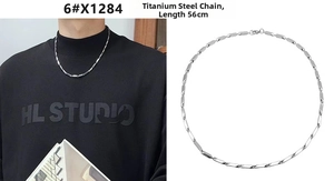 Detailed macro view of 56cm titanium steel geometric link necklace on model and white background