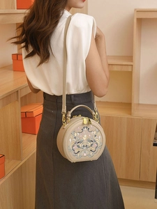 Ethnic style beige crossbody bag with exquisite floral embroidery and metal handles