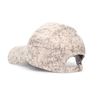 Detail of adjustable metal buckle and grey crackle pattern on suede baseball cap