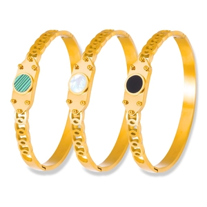 Three-piece gold plated stainless steel bangles with white shell and malachite inlays