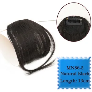 Detail of natural black air bangs hairpiece with 13cm length and secure clip design