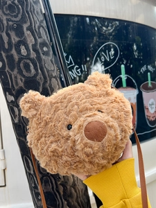Cute brown plush teddy bear crossbody bag with adjustable strap and fluffy texture