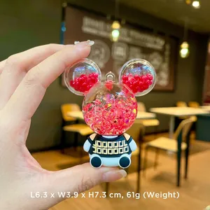 Detailed view of Mickey-style bear liquid keychain with glitter beads and size dimensions