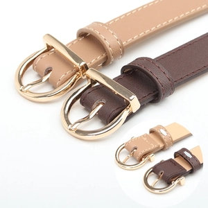 Stylish women's leather belt with D-shaped alloy buckle shown in brown and beige tones