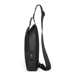 Men's waterproof black chest bag with USB charging port and breathable mesh back