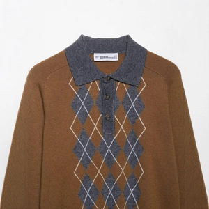 Women's argyle polo sweater in caramel brown with grey knit collar and button detail