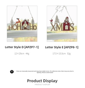 Close-up of wooden XMAS and HOHO ornaments with reindeer and Santa Claus details