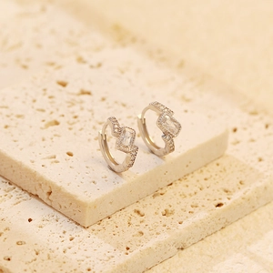 Detailed close-up of S925 silver hoop earrings with rectangular gemstone and zircon inlay