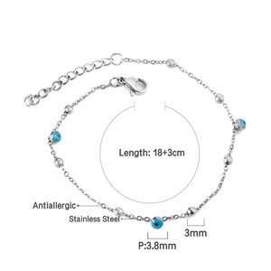 Close-up of stainless steel evil eye bracelet with 18+3cm chain and blue bead detail