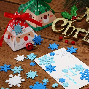 Christmas party decorations with DIY snowflake foam stickers and festive gift boxes