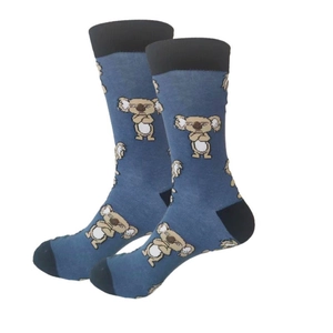 Detailed view of blue socks featuring cartoon koala patterns with black toe and heel