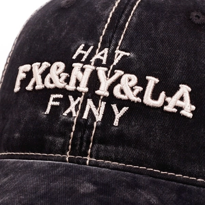 Vintage washed black cotton baseball cap with 3D embroidery and distressed detailing
