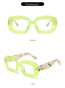 Macro detail of fluorescent green square glasses with printed temples and gold metal accents