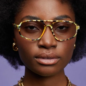 Front view of colorful tortoiseshell aviator glasses with double bridge on a model