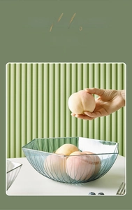 Detail of light blue transparent nut tray with vertical relief textures and modern design