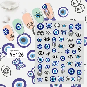 Detailed Me126 nail decals featuring blue evil eyes, butterflies and dreamcatcher designs