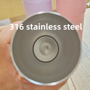Close-up of the internal SUS 316 stainless steel liner with engraved quality stamp
