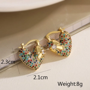 Detailed view of gold heart earrings with colorful rhinestones and dimensions shown