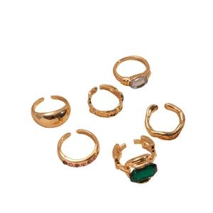 Vintage 6-piece gold ring set with geometric crystals and ruffled open band design