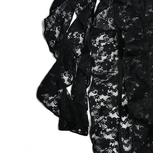 Gros plan sur la dentelle florale noire avec motifs complexes et texture transparente