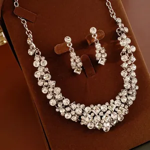 Luxury geometric diamond jewelry set with silver studs necklace for elegant evening wear