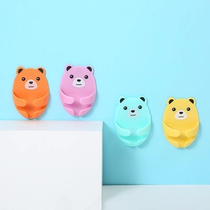 Adhesive bear wall hooks set in four pastel colors for cable and plug organization