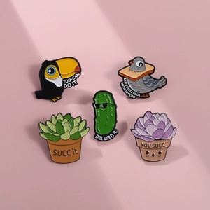 Detailed macro view of 5 unique enamel pins with cute plant and animal pun designs