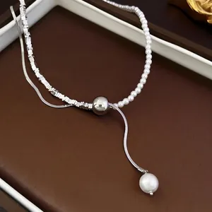 Minimalist pearl necklace with silver snake chain and pearl pendant in French style