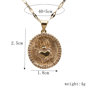 Detailed size chart for gold sacred heart necklace with zircon rose and flame pendant
