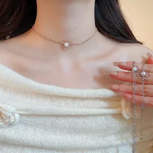 Elegant Korean style gold pearl flower choker with layered chains for women jewelry