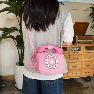 Pink vintage telephone-shaped crossbody bag with heart dial for women fashion