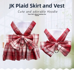 Detail view of red plaid pet JK dress showing breathable mesh lining and metal D-ring buckle