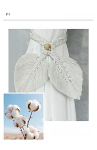 Detail of handcrafted bohemian cotton leaf curtain tieback with wooden bead and woven cord