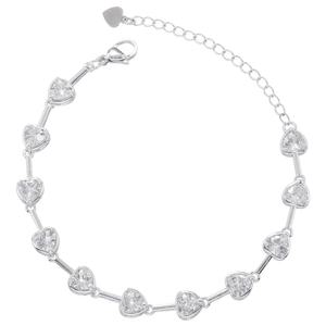 Detailed close-up of a silver heart-shaped crystal bracelet with lobster clasp